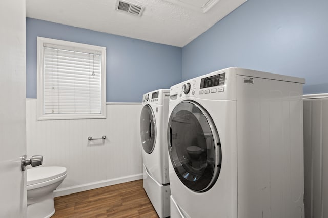 2371 Pierson Dr, Lexington, KY 40505 - washroom featuring washer and clothes dryer, wood finished floors, wainscoting, and baseboards