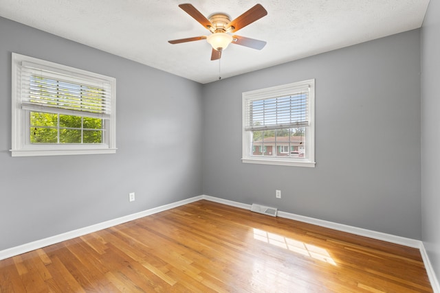 2371 Pierson Dr, Lexington, KY 40505 - unfurnished room with baseboards, wood finished floors, and ceiling fan