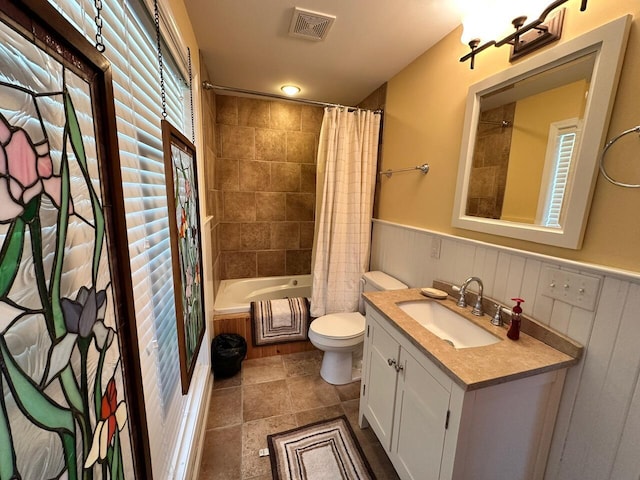 169 Kennedy Ln, Lancaster, KY 40444 - full bath featuring shower / bath combination with curtain, vanity, toilet, and a wainscoted wall