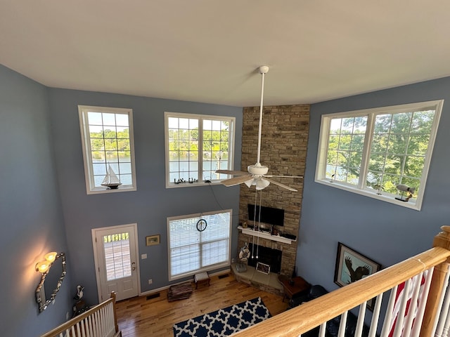 169 Kennedy Ln, Lancaster, KY 40444 - entryway with a ceiling fan, wood finished floors, a fireplace, and baseboards