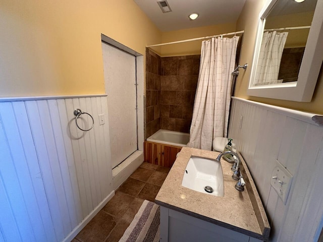 169 Kennedy Ln, Lancaster, KY 40444 - full bathroom with wainscoting, vanity, tile patterned floors, and shower / bath combination with curtain