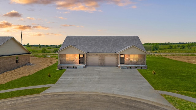 5001/5003 Melana Way, Richmond, KY 40475 - view of front of home with a lawn, an attached garage, driveway, and brick siding