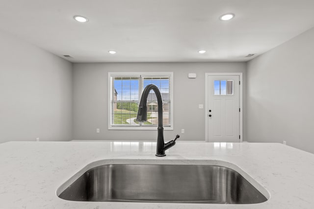 5001/5003 Melana Way, Richmond, KY 40475 - kitchen view of a sink, light stone countertops, and recessed lighting