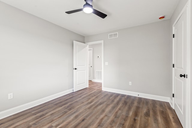 5001/5003 Melana Way, Richmond, KY 40475 - unfurnished bedroom featuring dark wood-type flooring, baseboards, and a ceiling fan