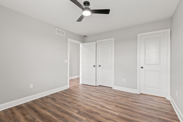 5001/5003 Melana Way, Richmond, KY 40475 - unfurnished bedroom featuring wood finished floors, baseboards, and ceiling fan