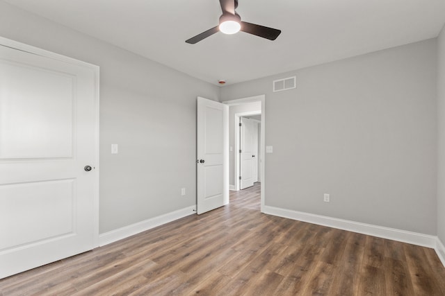 5001/5003 Melana Way, Richmond, KY 40475 - unfurnished bedroom with baseboards, wood finished floors, and ceiling fan