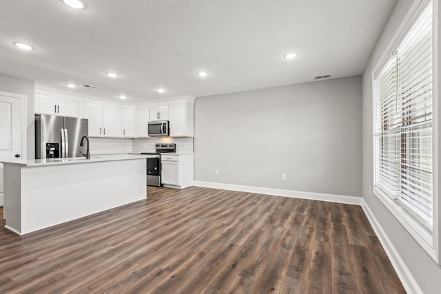 5001/5003 Melana Way, Richmond, KY 40475 - kitchen featuring stainless steel appliances, dark wood-style floors, tasteful backsplash, baseboards, and recessed lighting