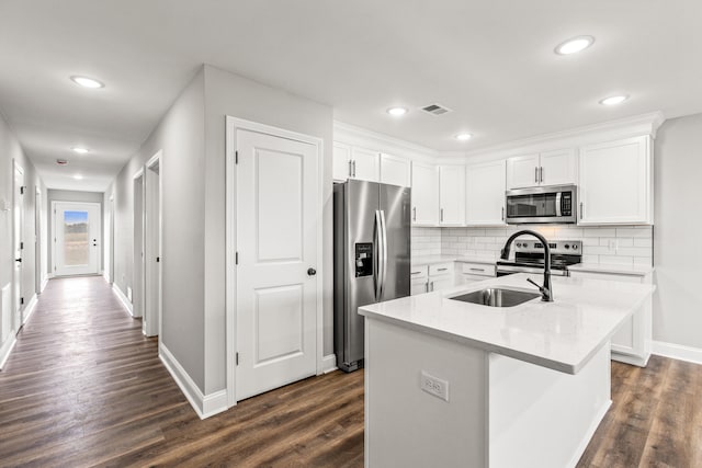 5001/5003 Melana Way, Richmond, KY 40475 - kitchen with appliances with stainless steel finishes, dark wood-style flooring, decorative backsplash, white cabinetry, and recessed lighting