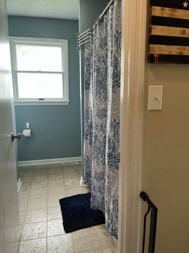 212 Winding Way, Wilmore, KY 40390 - bathroom featuring baseboards