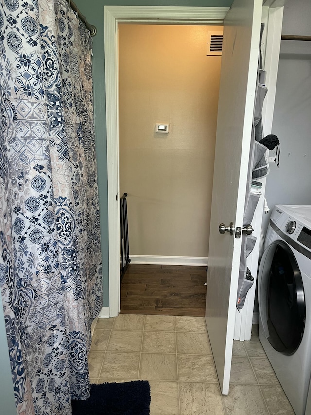 212 Winding Way, Wilmore, KY 40390 - laundry area with washer / clothes dryer and baseboards