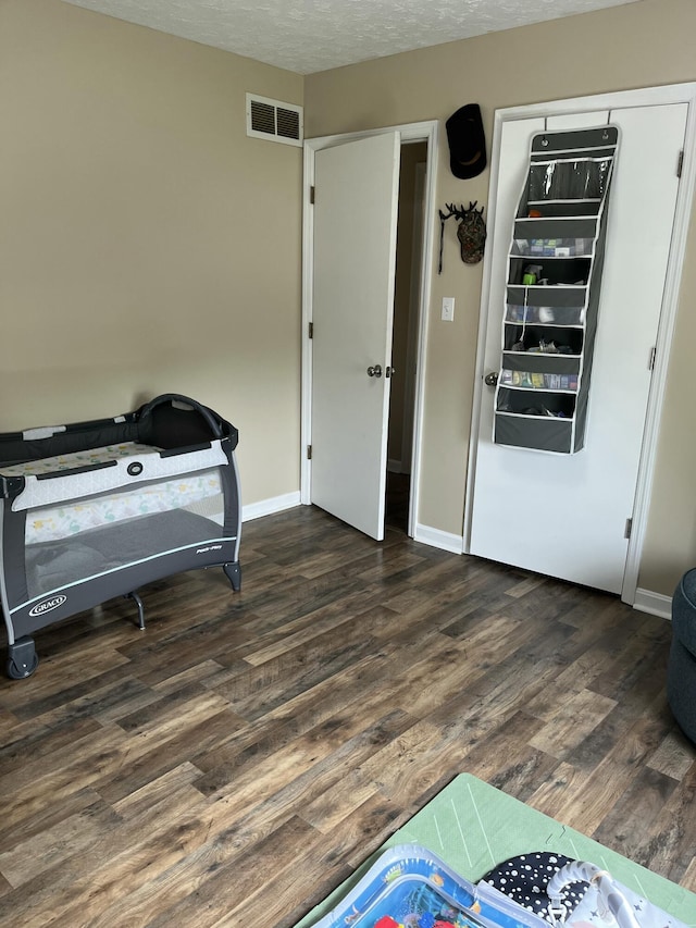 212 Winding Way, Wilmore, KY 40390 - interior space with wood finished floors, baseboards, and a textured ceiling