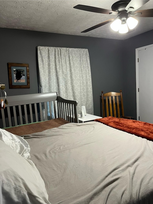 212 Winding Way, Wilmore, KY 40390 - bedroom featuring a ceiling fan and a textured ceiling