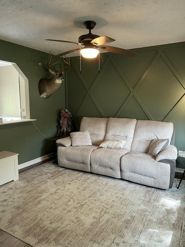 212 Winding Way, Wilmore, KY 40390 - living area with a ceiling fan, baseboards, and a textured ceiling
