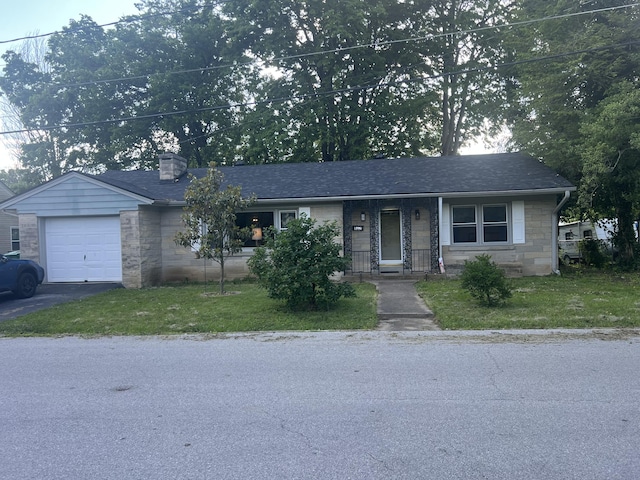 122 Mac Ct, Harrodsburg, KY 40330 - single story home featuring stone siding, an attached garage, driveway, and a front yard