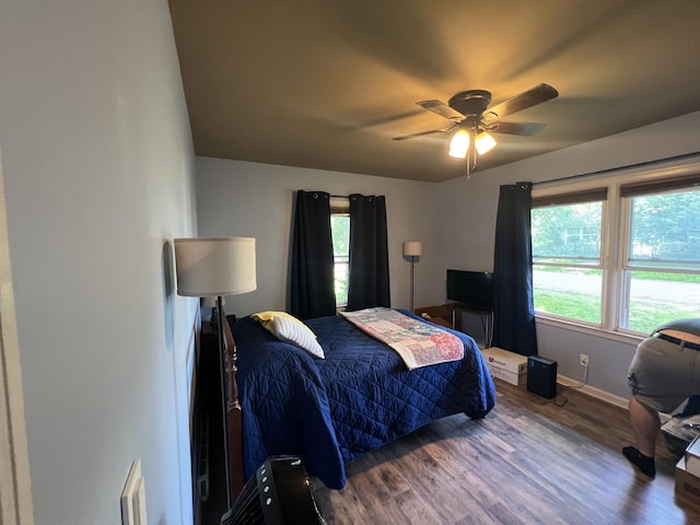 122 Mac Ct, Harrodsburg, KY 40330 - bedroom with wood finished floors, multiple windows, baseboards, and ceiling fan