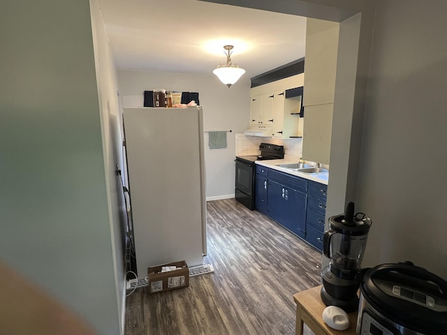 122 Mac Ct, Harrodsburg, KY 40330 - kitchen with blue cabinets, electric range, dark wood-type flooring, decorative backsplash, and a sink