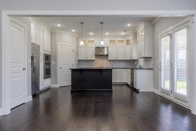 3880 Leighton Ln, Lexington, KY 40515 - kitchen with stainless steel appliances, under cabinet range hood, dark countertops, dark wood-type flooring, and recessed lighting