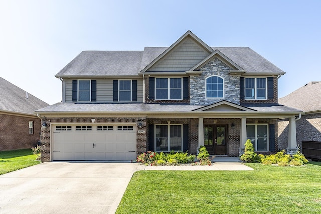 3880 Leighton Ln, Lexington, KY 40515 - craftsman-style house featuring a front lawn, concrete driveway, french doors, and brick siding