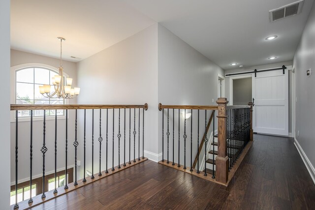 3880 Leighton Ln, Lexington, KY 40515 - hall featuring wood finished floors, a chandelier, recessed lighting, baseboards, and an upstairs landing