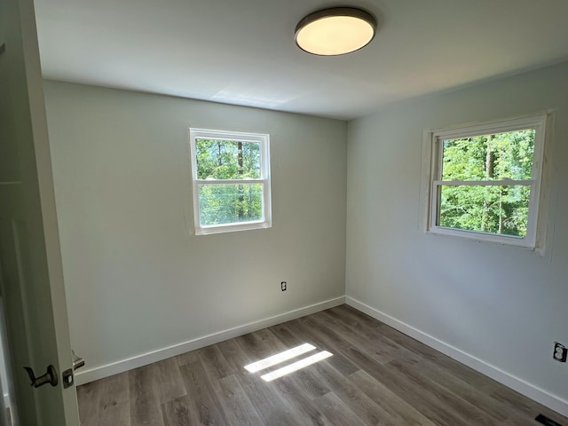 819 Scotts Chapel Rd, Jamestown, KY 42629 - unfurnished room featuring baseboards and wood finished floors
