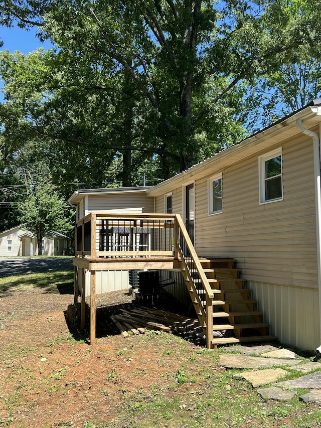 819 Scotts Chapel Rd, Jamestown, KY 42629 - back of property featuring stairway and a wooden deck