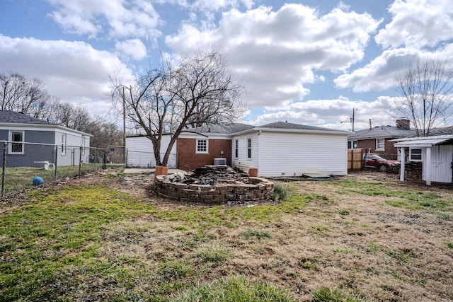 108 Rancho Ct, Frankfort, KY 40601 - back of property with a fire pit and an outbuilding