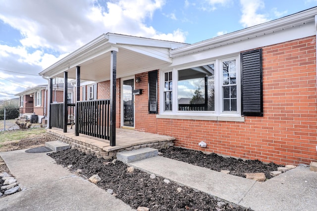 108 Rancho Ct, Frankfort, KY 40601 - doorway to property featuring covered porch and brick siding