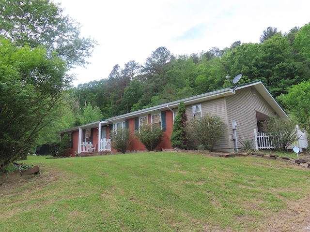 3200 US-60 W, Morehead, KY 40351 - view of front facade featuring a porch, a front yard, and a wooded view