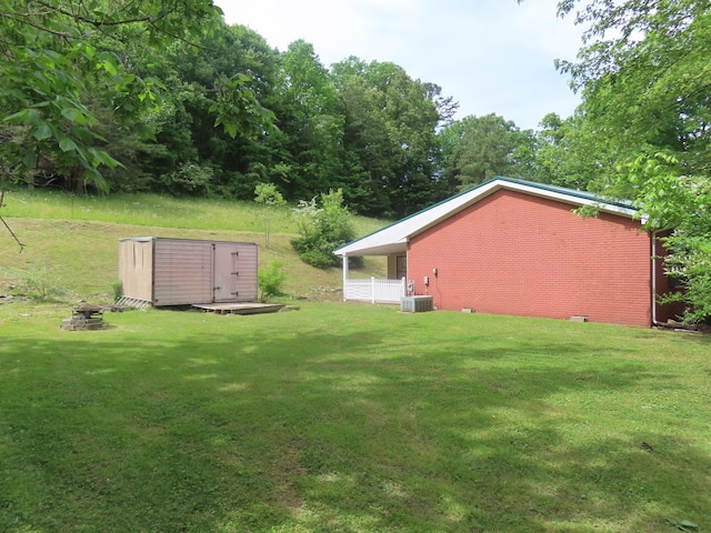 3200 US-60 W, Morehead, KY 40351 - view of green lawn featuring central AC and an outdoor fire pit