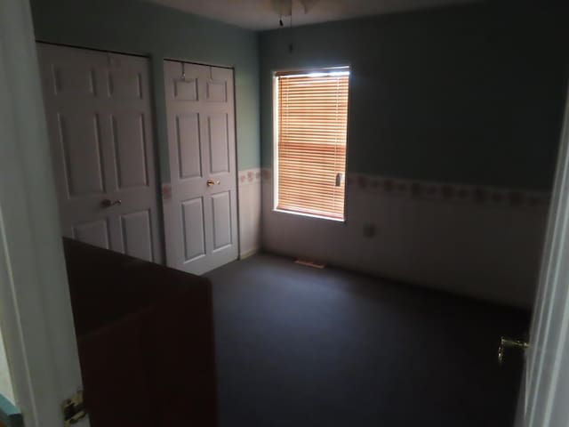 3200 US-60 W, Morehead, KY 40351 - unfurnished bedroom featuring multiple windows