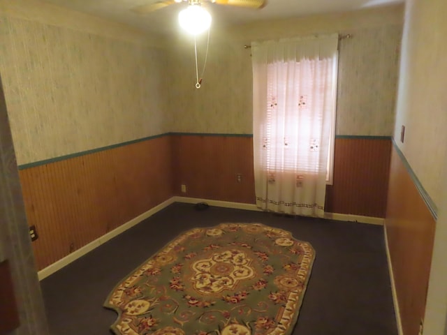 3200 US-60 W, Morehead, KY 40351 - spare room featuring wainscoting, wallpapered walls, a ceiling fan, and baseboards