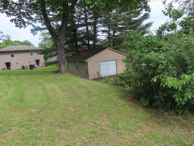 3200 US-60 W, Morehead, KY 40351 - view of grassy yard with a detached garage, an outbuilding, and central AC