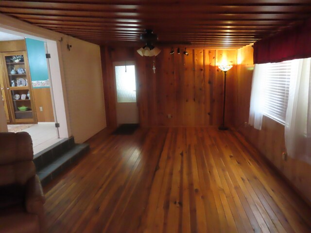 3200 US-60 W, Morehead, KY 40351 - unfurnished living room with hardwood / wood-style floors and wood walls