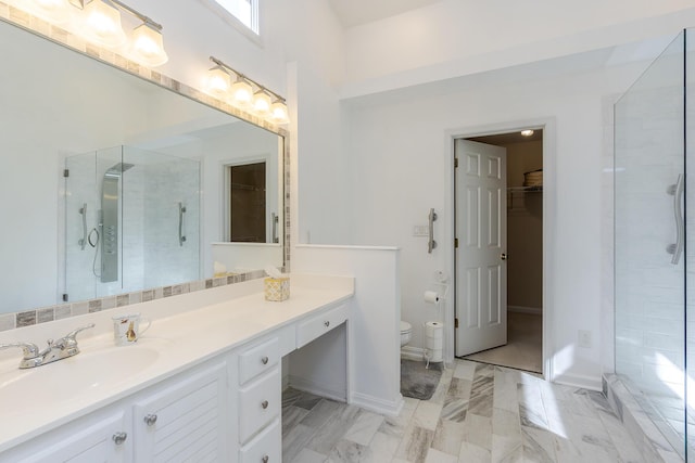 4140 Clearwater Way, Lexington, KY 40515 - bathroom with a walk in closet, vanity, a stall shower, toilet, and marble finish floors