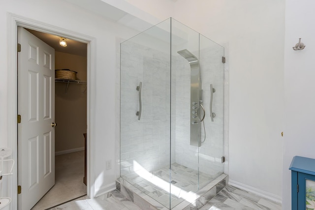 4140 Clearwater Way, Lexington, KY 40515 - full bath featuring a stall shower, a spacious closet, and baseboards