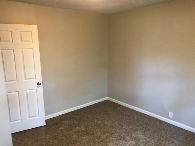 624 Richardson Ln, Frankfort, KY 40601 - unfurnished room featuring dark colored carpet and baseboards