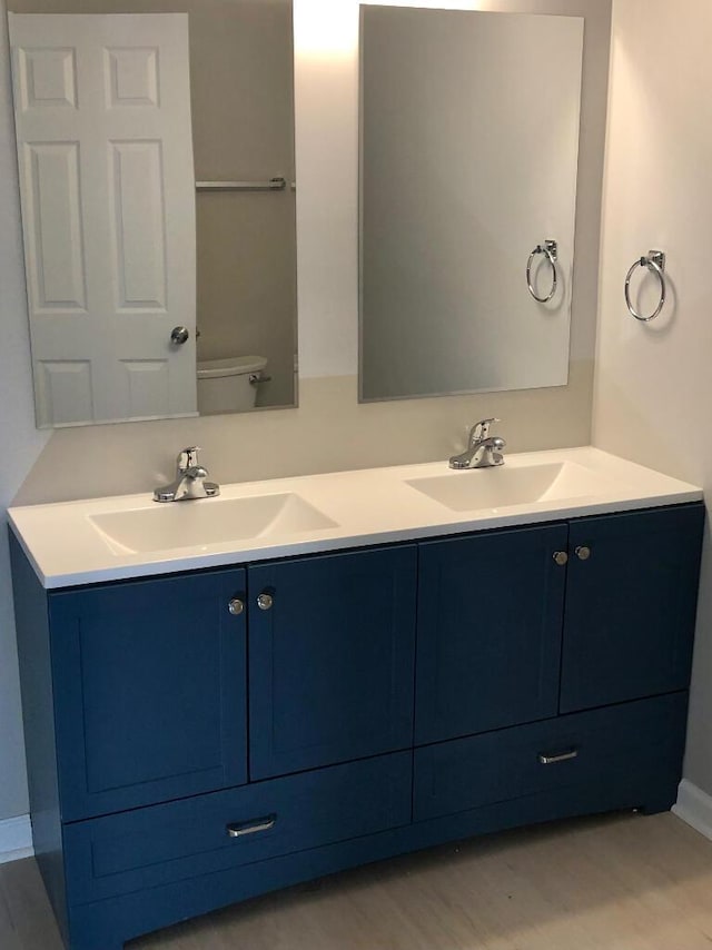624 Richardson Ln, Frankfort, KY 40601 - bathroom featuring double vanity and baseboards