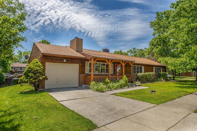 428 Patchen Dr, Lexington, KY 40517 - ranch-style house featuring an attached garage, a porch, a front lawn, a chimney, and driveway