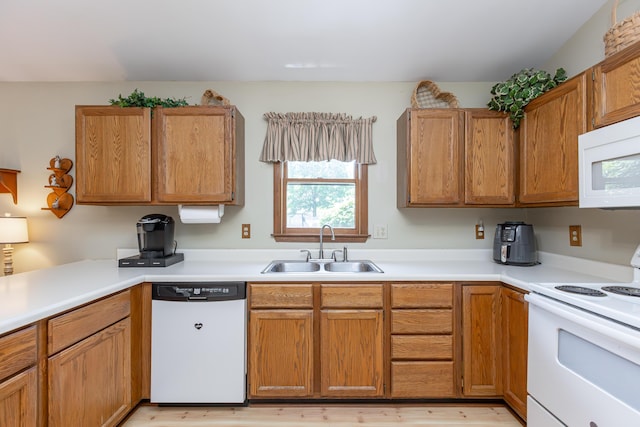 428 Patchen Dr, Lexington, KY 40517 - kitchen featuring white appliances, a sink, plenty of natural light, and light countertops