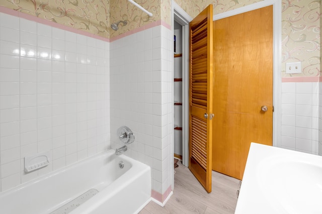 900 Shoshoni Trl, Georgetown, KY 40324 - bathroom featuring wallpapered walls, shower / tub combination, vanity, and wood finished floors