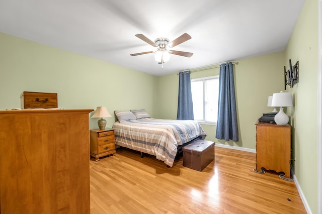 900 Shoshoni Trl, Georgetown, KY 40324 - bedroom with light wood-style flooring, baseboards, and a ceiling fan