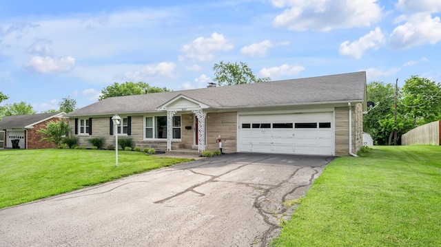 900 Shoshoni Trl, Georgetown, KY 40324 - ranch-style house with driveway, a garage, and a front yard