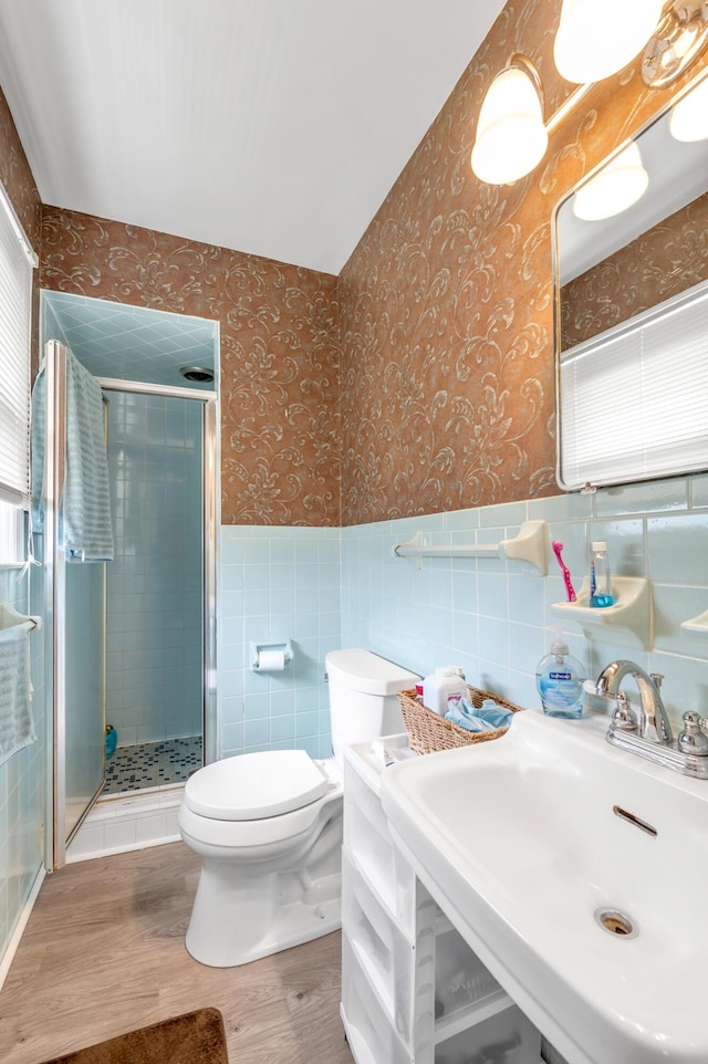 900 Shoshoni Trl, Georgetown, KY 40324 - bathroom with wallpapered walls, wood finished floors, toilet, a sink, and a stall shower
