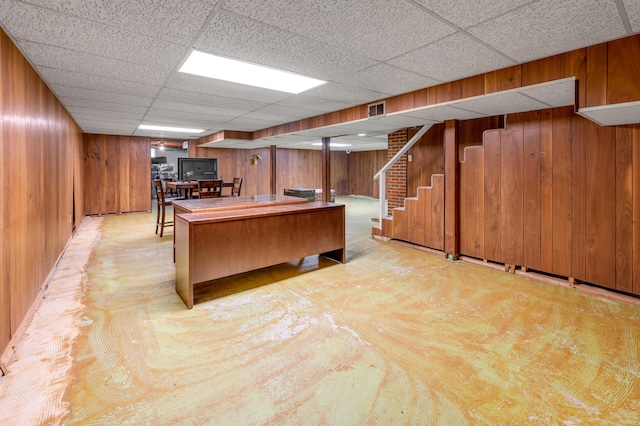 900 Shoshoni Trl, Georgetown, KY 40324 - office with a paneled ceiling, wood walls, and concrete floors