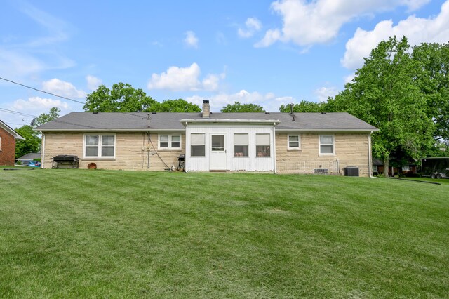 900 Shoshoni Trl, Georgetown, KY 40324 - rear view of house with a chimney, a yard, central AC, and stone siding