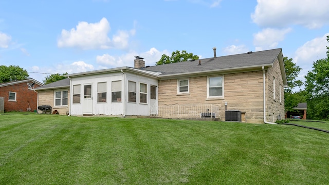 900 Shoshoni Trl, Georgetown, KY 40324 - rear view of house featuring a yard, a chimney, and stone siding