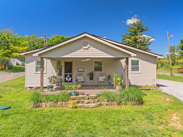 4496 Fords Mill Rd, Versailles, KY 40383 - view of front of home featuring a porch and a front lawn