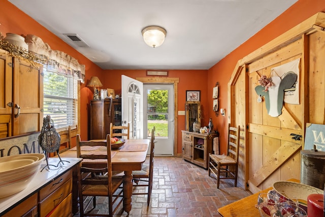 4496 Fords Mill Rd, Versailles, KY 40383 - dining room featuring plenty of natural light and brick flooring