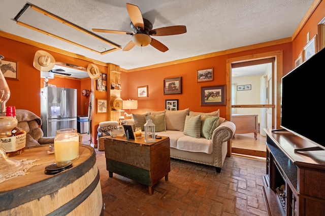 4496 Fords Mill Rd, Versailles, KY 40383 - living area featuring a ceiling fan, brick flooring, and a textured ceiling