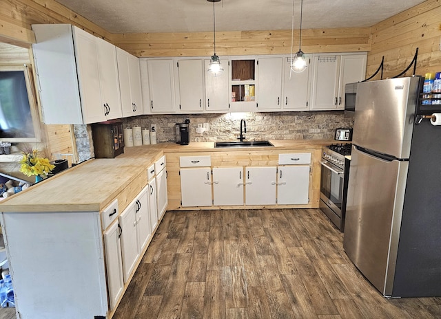 270 Newcomb Ave, Mount Vernon, KY 40456 - kitchen with stainless steel appliances, a sink, dark wood-style flooring, open shelves, and tasteful backsplash